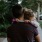 lifestyle image of a man carrying a child