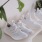 white shoes on a counter